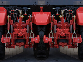 Agricultural machinery and parts of mechanisms on a sunny day. Texture, background for design. 