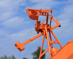 Agricultural machinery and parts of mechanisms on a sunny day. Texture, background for design. 