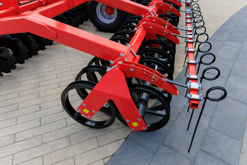 Agricultural machinery and parts of mechanisms on a sunny day. Texture, background for design. 