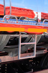Agricultural machinery and parts of mechanisms on a sunny day. Texture, background for design. 