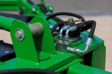 Agricultural machinery and parts of mechanisms on a sunny day. Texture, background for design. 