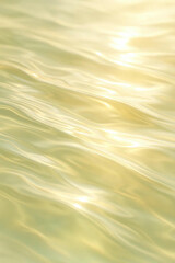 Obraz premium Abstract Golden Water Surface: Fluid Reflections, Soft Light, Serene Texture.