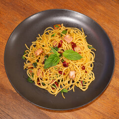 Spaghetti Aglio e Olio is a pasta dish that emphasizes the aroma of garlic and olive oil,...