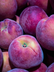 Vertical image of fresh ripe peaches

