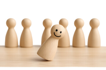 Happy wooden pawn standing out from the crowd on transparent background