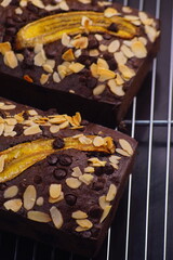 Vegan banana cake, Banana cake with almonds and chocolate chips on top, Banana bread or cake for breakfast and celebration cakes.