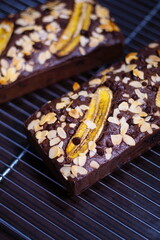Vegan banana cake, Banana cake with almonds and chocolate chips on top, Banana bread or cake for breakfast and celebration cakes.