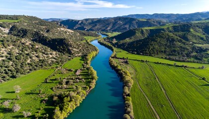 River winding through green valley