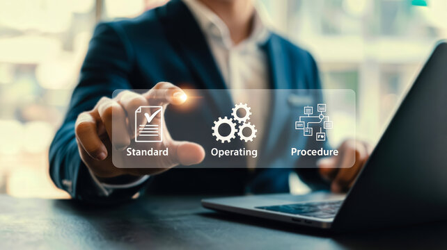 A person interacts with a digital interface displaying standard operating procedures and workflow diagrams