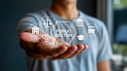 A person holds out their hand, displaying a glowing hexagonal interface with icons representing various public sector services and concepts