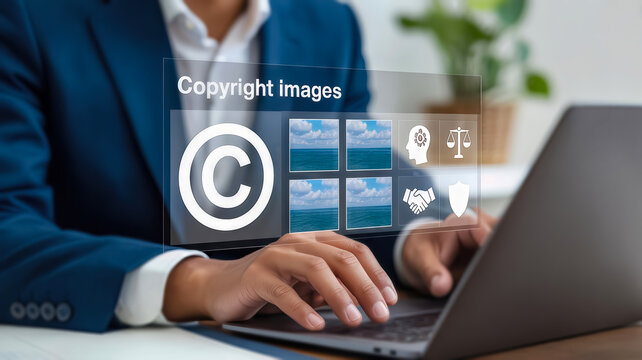 A businessman in a blue suit uses a laptop to manage copyright images, with icons representing legal protection and digital content