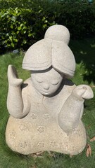 stone statue in garden