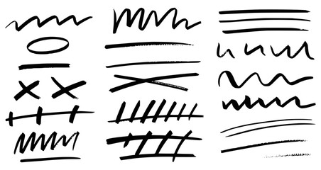 Collection of black hand drawn brush strokes and scribbles on white background vector