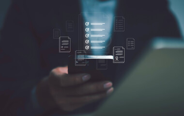 Businessman checklist concept as clipboard document checklist form on the virtual screen Use your...