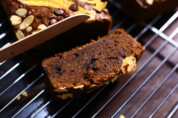 Vegan banana cake, Banana cake with almonds and chocolate chips on top, Banana bread or cake for breakfast and celebration cakes.
