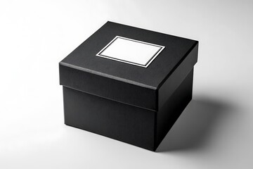 Elegant black box with a white label on top, isolated shot