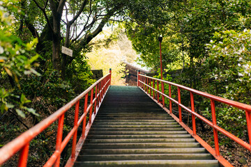 Obraz premium shikoku, JAPAN - may 2 2025 Iyadani Temple No. 71 Red Staircase in the Shikoku Pilgrimage