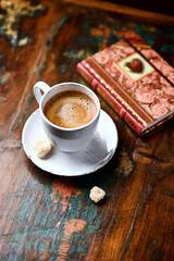 Cup of coffee on wooden background. Soft focus. Copy space	