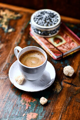 Cup of coffee on wooden background. Soft focus. Copy space	