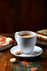 Cup of coffee on wooden background. Soft focus. Copy space	