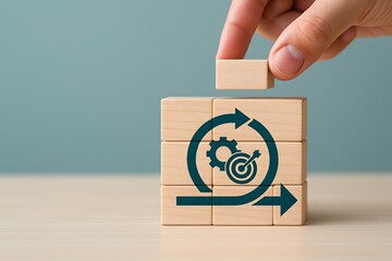 Agile methodology concept with wooden blocks and target symbol