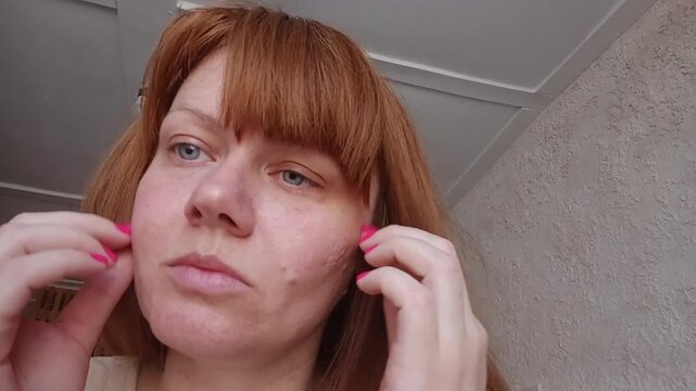 A woman is trying to put herself in order