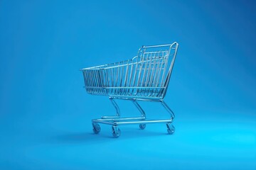 Empty shopping cart against vibrant blue backdrop