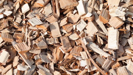 The photo shows a close-up of wood chips