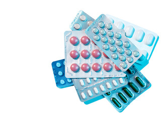 Top view of of various medicine blister packs on white background