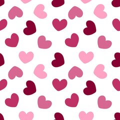 Playful pattern of pink and red hearts on white background. Ideal for Valentine's Day, love-themed designs, wrapping, or kids' items.