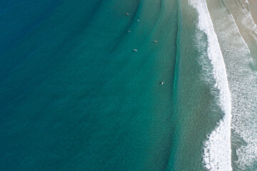 Top Down Drone Shot of People Surfing on Longboards