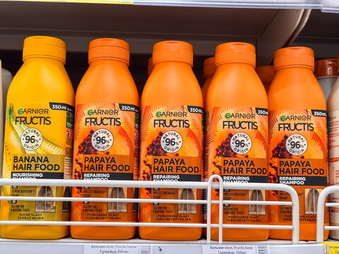 Garnier Fructis Hair Food Shampoos with Banana and Papaya Scents on Store Shelf, Dnipro, Ukraine - June 20, 2025