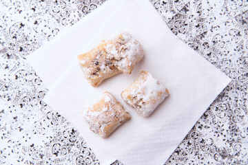Stollen Bites on bright background. Soft focus. Close up. Copy space.	