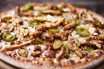 Gyros Pizza with jalapeno pepper and mozzarella cheese. Soft focus. Close up.	
