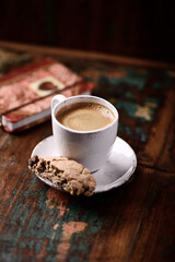 Cup of coffee on wooden background. Soft focus. Copy space