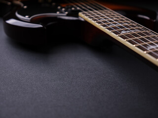 Fretboard of modern electric guitar. Close up.	