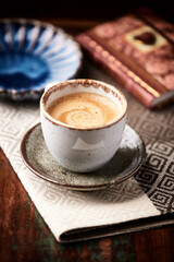Cup of coffee on wooden background. Soft focus. Copy space	