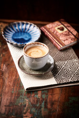 Cup of coffee on wooden background. Soft focus. Copy space	