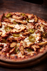 Gyros Pizza with jalapeno pepper and mozzarella cheese. Soft focus. Close up.	