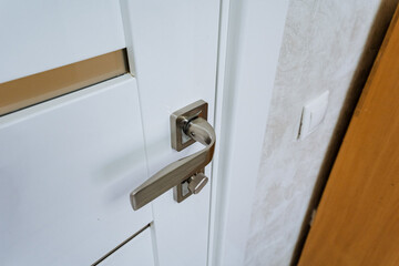 Introducing a stylish modern door handle and lock, perfect for enhancing contemporary interior...