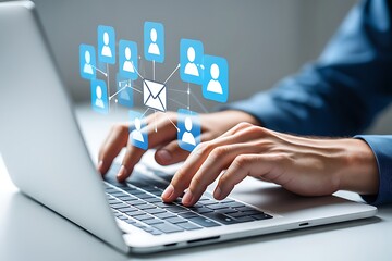 Hands typing on laptop with email and people icons