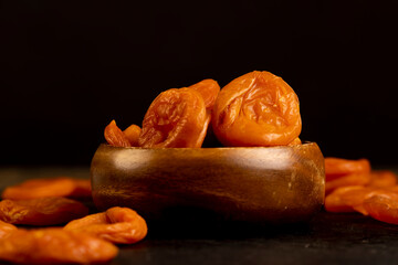 a large number of dried apricots used in cooking, orange dried apricots from small apricots are...