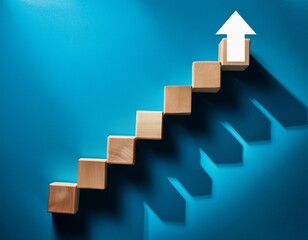 wooden blocks forming ascending stairs with a white upward arrow symbolizing growth progress and success in business or career