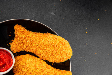 Fish sticks fishs shaped breaded fish nuggets fast food fresh delicious gourmet food background on...