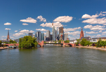 View of the skyline and the Main River with Alte Bruecke bridge in Frankfurt am Main Germany on a...