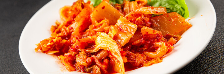Kimchi pickled cabbage salad spicy savory vegetables fresh delicious gourmet food background on the table rustic food top view copy space vegetarian and vegan food