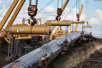 Installation of a huge industrial gas pipe line on a field