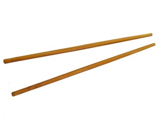 A pair of wooden chopsticks placed on a white background. Two wooden chopsticks made of wood. Wooden chopsticks are tools for eating. Wooden chopsticks. Viewed from above.