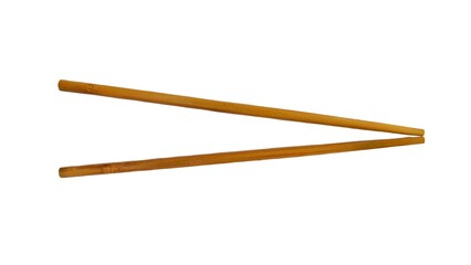 A pair of wooden chopsticks placed on a white background. Two wooden chopsticks made of wood. Wooden chopsticks are tools for eating. Wooden chopsticks. Viewed from above.