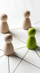 Obraz premium Four connected wooden figures on a white surface connection network